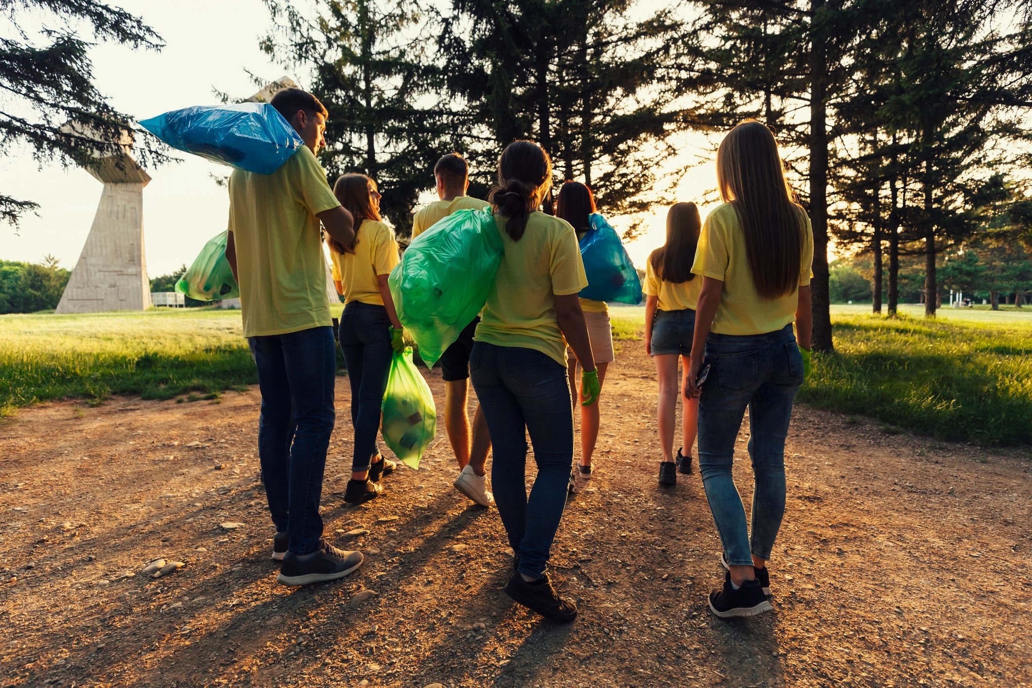Volunteers cleaning up a city park together