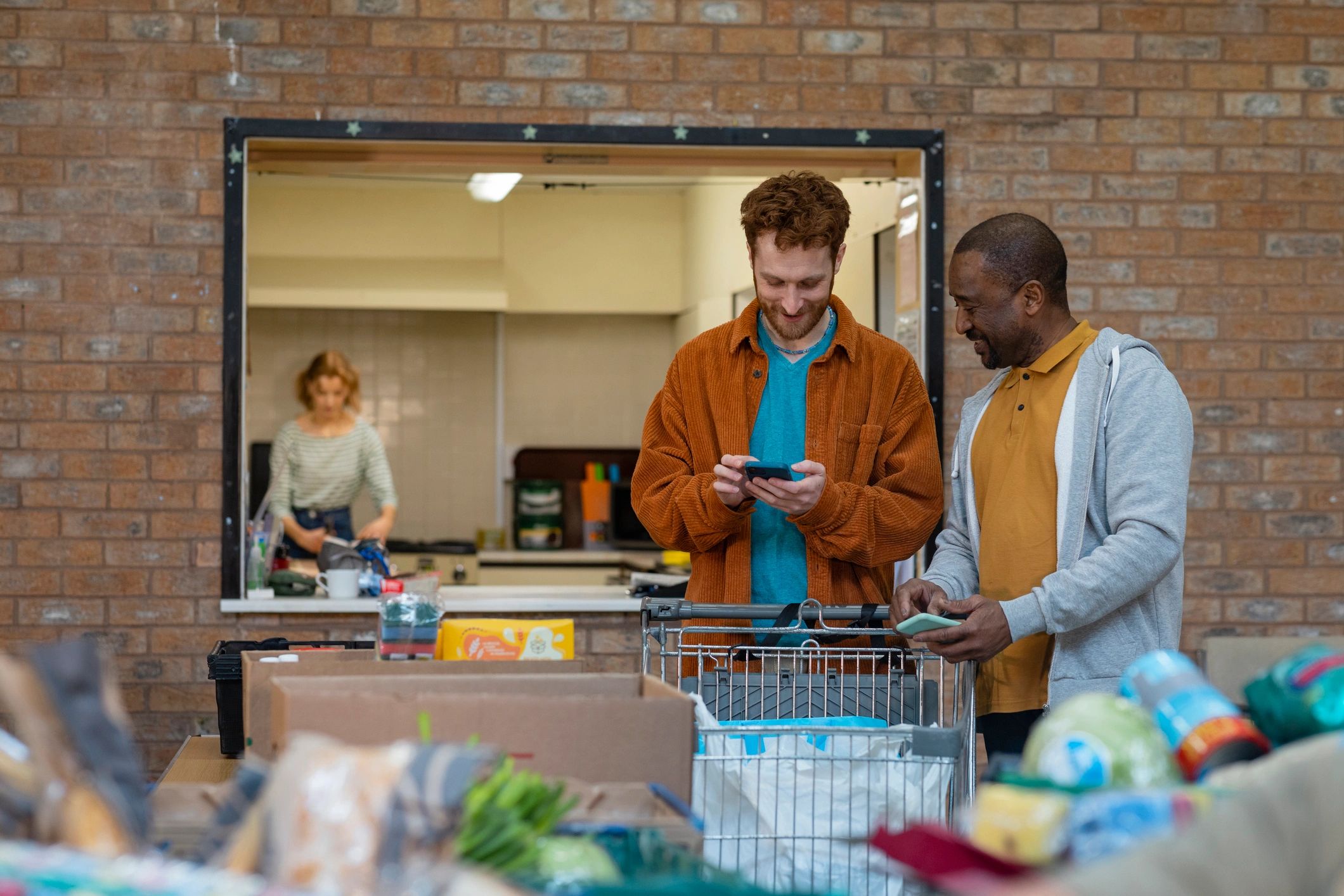 Volunteers organizing donated food and supplies together