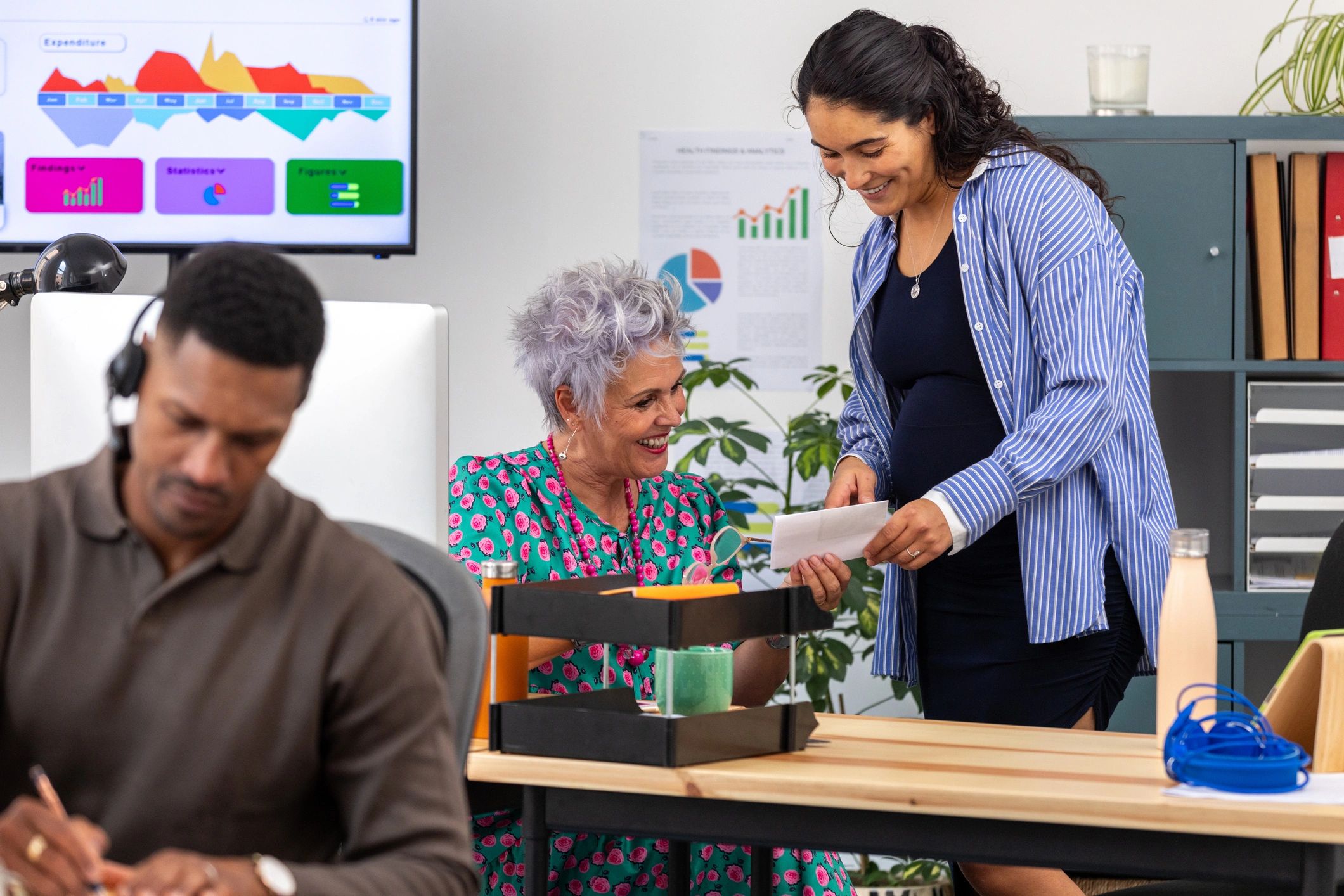 Colleagues in conversation in an inclusive learning environment
