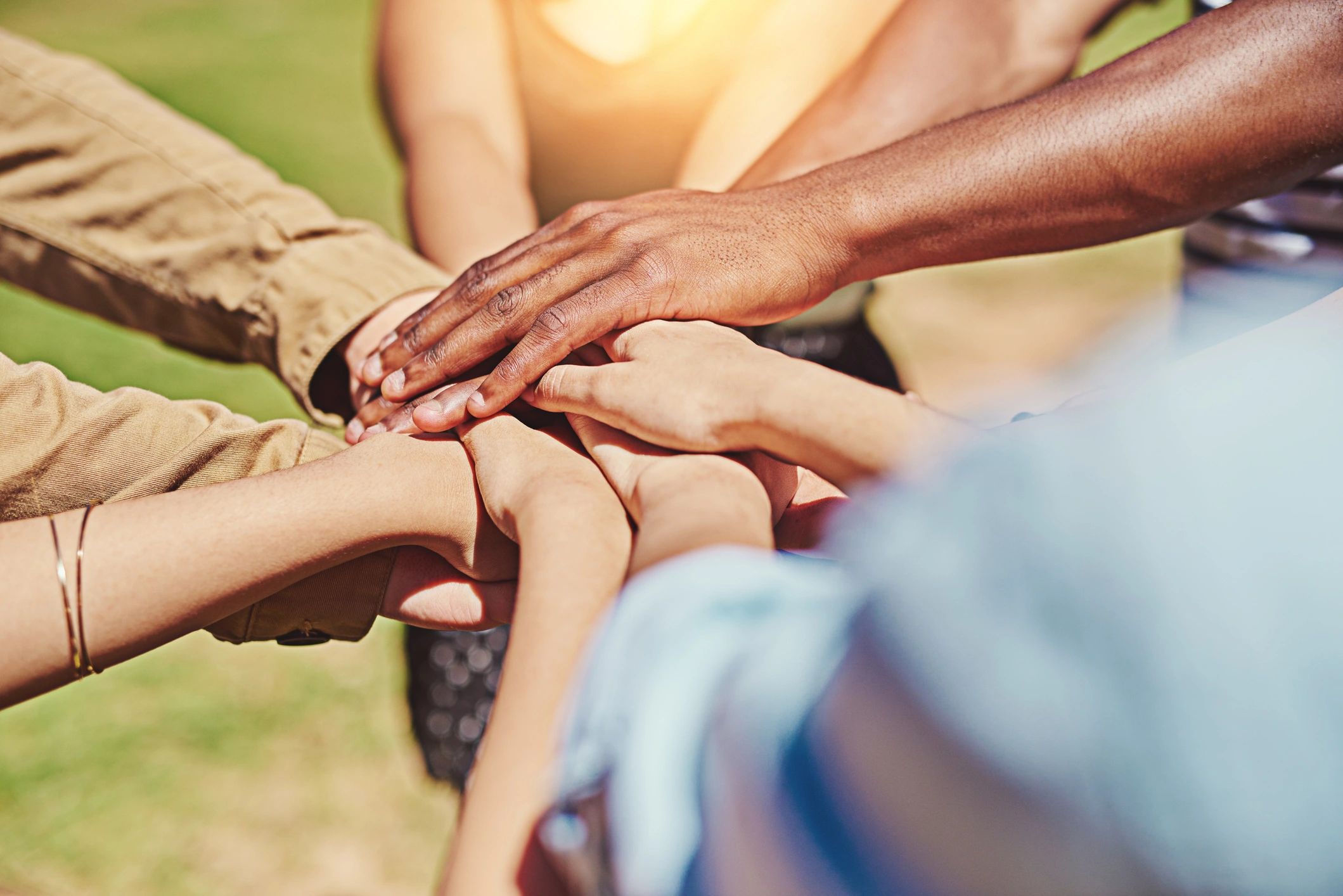 Hands joined together in teamwork and support
